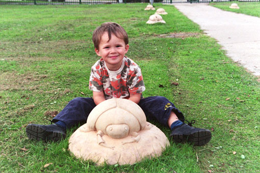 Ladybird Sculpture and Child